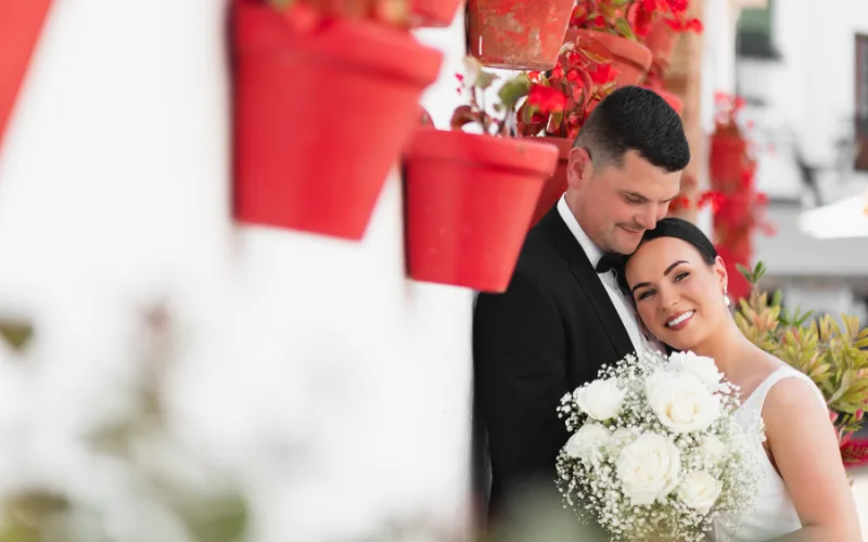 Wedding planner with a couple touring a Marbella rustic wedding venue