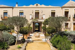 Couple viewing a Mallorca wedding venue by live video tour from abroad