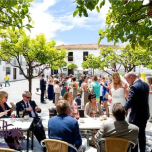 Beach club wedding ceremony set up on the sand in Benalmádena