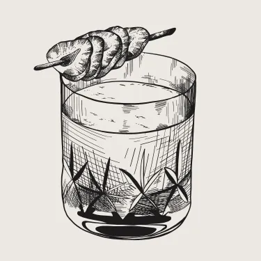 a whiskey sour cocktail with orange peel